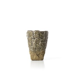  A grey stone vase with a textured, irregular surface resembling natural rock. The vase has a tall, cylindrical shape and is suitable for displaying flowers or other decorative items.