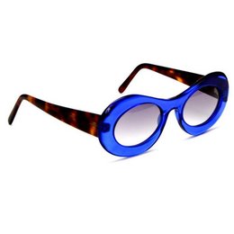 Translucent blue oval sunglasses with tortoiseshell accents.