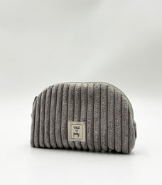  Grey corduroy vanity bag with waterproof interior, suitable for storing makeup and other personal items.