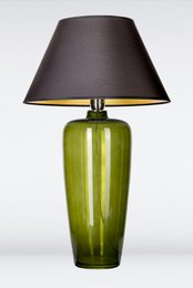  Tall, narrow green glass table lamp with black fabric lampshade.