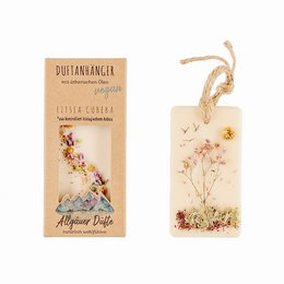 Fragrant pendant with dried flowers and leaves, featuring a natural, earthy style.