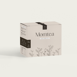 A box of Momtea tea, featuring a minimalist black and white design with floral illustrations.