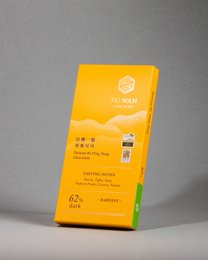 Dark chocolate bar with 62% cocoa content from Taiwan. Features a bright yellow packaging with a sun icon and text in Chinese and English.