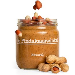 Natural peanut butter with peanut pieces, creamy texture, made from high-quality peanuts.