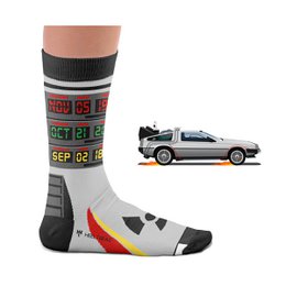 Grey and black socks with a retro time machine design, featuring colorful accents and text displaying dates.