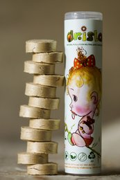 Bamboo tab wipes in a cylindrical container with a colorful floral design, containing soft, absorbent bamboo wipes for baby care.