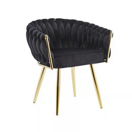 Plush black velvet chair with a gold metal frame and legs, featuring a tufted backrest for a luxurious and stylish design.