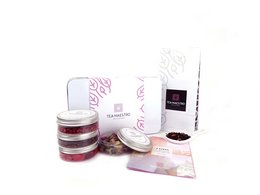 Blend It Yourself package - Love, a tea set with pink and white packaging, includes tea leaves, tea infuser, and tea accessories.