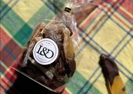 Dark chocolate-coated candied ginger with a rich, intense flavor. The ginger pieces are coated in premium dark chocolate, creating a delightful contrast of spicy and sweet.