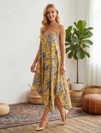 Sleeveless paisley print midi dress, flowy bohemian style, available in mustard and navy colorways.
