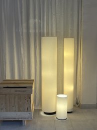  Tall, cylindrical floor lamp with natural canvas, cotonet sand, hessian beige, and saco fabric options in 20x150x20, 30x150x30, and 30x100x30 sizes.