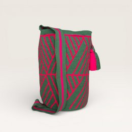  A geometric backpack in forest colors, featuring a bold, abstract pattern in shades of red, green, and brown.