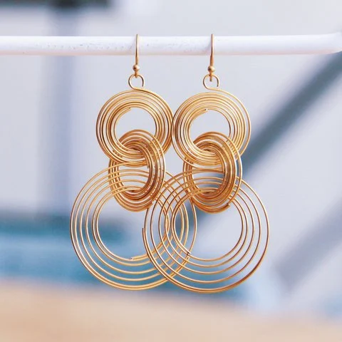 Stainless steel statement earring twisted rings - gold