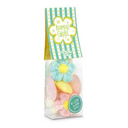 Colorful candy bag with floral design and assorted pastel-colored candies. Includes text "Happy Easter" on the packaging.