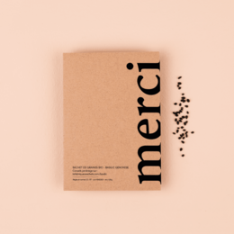 A small sachet of basil seeds with the text "Thank you" printed on the packaging. The packaging has a minimalist, natural design with a neutral color palette.