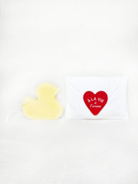 Upcycled cotton clutch with heart-shaped patch design. Features a red heart-shaped patch with the text "A la vie" (To life) in white.