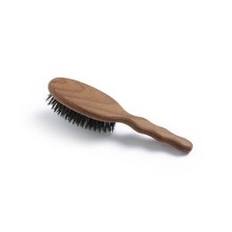 Small wooden boar bristle hair brush with dark bristles.