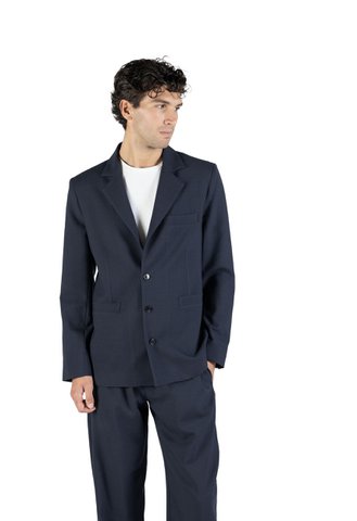 Schmal geschnittener Wollblazer in Blau-auf-Blau-Webart, hergestellt in Italien