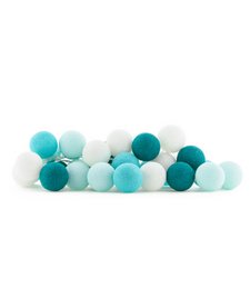 Aqua-colored string lights with an adapter, available in multiple lengths, displayed in a woven basket with decorative turquoise and white pom-poms.