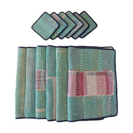  Set of 6 multicolored patterned placemats and coasters made from kantha fabric.