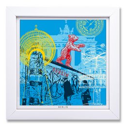 A vibrant, colorful art print depicting a scene in Berlin, featuring a white wooden frame. The image showcases various architectural elements, including a dome-shaped structure, a silhouetted figure, and a stylized cityscape with a red bird-like figure in the foreground.