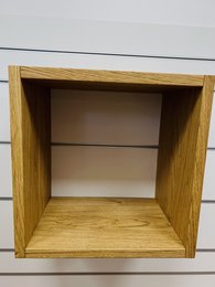 Wooden cube-shaped pet toy with closed design, suitable for small animals like hamsters or guinea pigs.