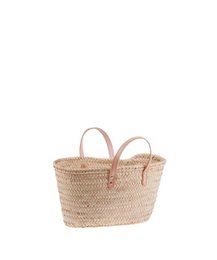  Woven straw shopping bag with leather handles. Oval-shaped with a natural, rustic appearance. Suitable for everyday use or as a beach bag.