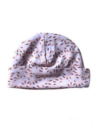 Soft, cozy baby hat in a light pink color with a delicate pattern of small twigs or branches. Suitable for newborns and infants.