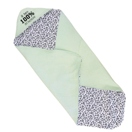 Mint green wrap cape with leopard print pattern. Made of 100% cotton.