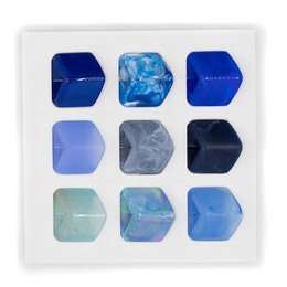  Sustainable display for 3D printed bio plastic cubes in red. Includes 9 cube variants in different shapes and patterns.