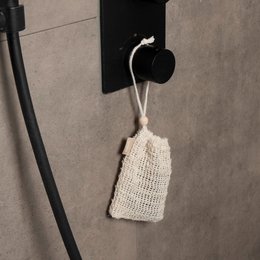 Solid bar soap with white bead, available in black, wooden, and white bead variants. Handcrafted, natural soap bar with a crocheted holder.