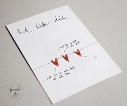 A white postcard with the text "I love you because..." and three red hearts drawn below it. The postcard appears to be a simple, minimalist design focused on expressing love and affection.