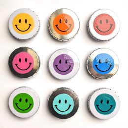  A set of 9 colorful smiley face stickers or buttons in various shades of yellow, orange, pink, purple, blue, and green. The stickers have a glossy, reflective finish and are arranged in a grid pattern.