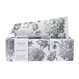 Floral-patterned shea butter hand cream in a rectangular package with a white and brown color scheme.