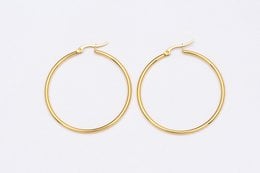 Gold-tone stainless steel hoop earrings with a classic, simple design.