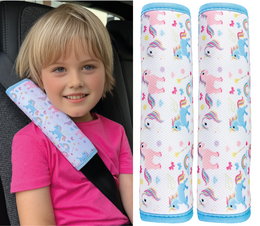 Colorful unicorn-patterned car seat belt protectors for kids, featuring a soft, padded design to provide comfort and safety during travel.