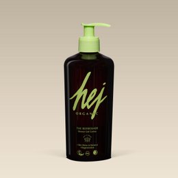 A dark brown bottle with a green pump dispenser, labeled "hey" shower gel. The bottle appears to be 500ml in size and is part of the shower gel product category.