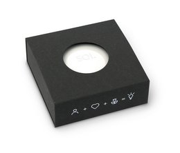 Automatic flashlight with SOI. branding, round white body, and control buttons.