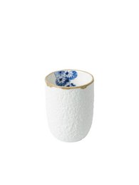 A white ceramic espresso cup with a blue floral design. The cup has a textured surface and a simple, elegant design.