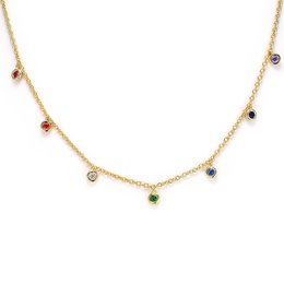 A delicate gold chain necklace with colorful gemstone charms dangling along the length, creating a fresh and vibrant look.