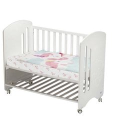 A white wooden cot bed with a striped mattress and a pink and white floral pattern. The cot has a slatted base and wheels for easy mobility.
