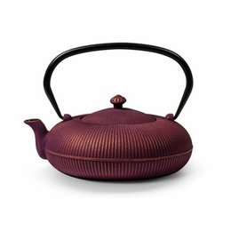 A large, round cast iron teapot in a deep burgundy color with a stainless steel filter. The teapot has a classic, traditional design with a curved handle and a domed lid.
