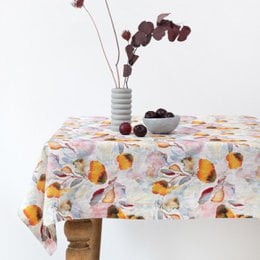 Botany linen tablecloth in multiple colors and sizes, featuring a floral pattern.