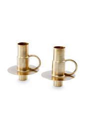 Set of 2 gold-colored metal candle holders, each measuring 7x8.5cm. Suitable for holding standard candles.