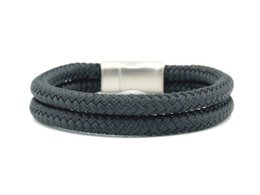 Black braided bracelet made from recycled materials, with a silver-colored metal clasp.