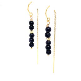  Elegant black beaded earrings with a gold-tone finish, perfect for adding a touch of sparkle to any outfit.