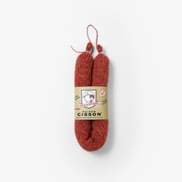 Spicy chorizo sausage from the Basque country, made with traditional methods and ingredients. The sausage has a vibrant red color and a distinctive spicy flavor.