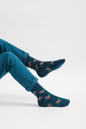 Colorful children's socks with tropical parrot print, available in sizes 2/3Y, 4/6Y, and 7/9Y.