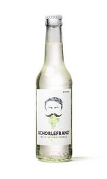 White wine spritzer in a 0.33l glass bottle with a label featuring a portrait image.