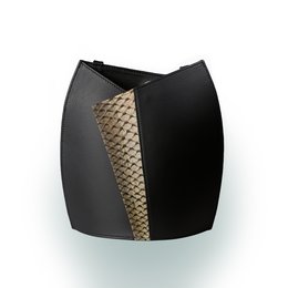 Black shoulder bag with contrasting textured panel, featuring a sleek and stylish design.